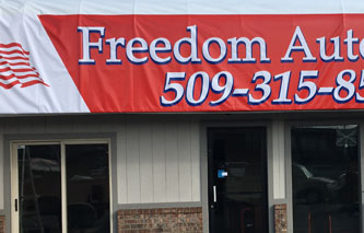 Sign Banner: Freedom Auto Sales